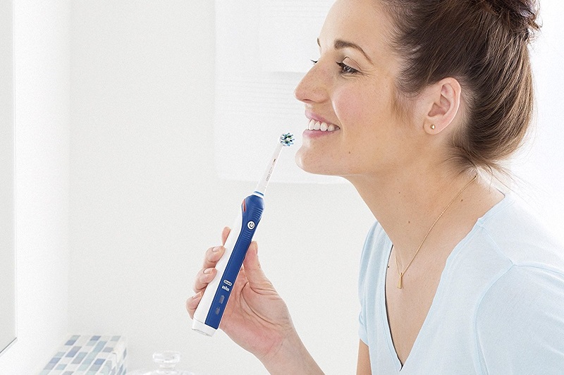 how to brush with an electric toothbrush